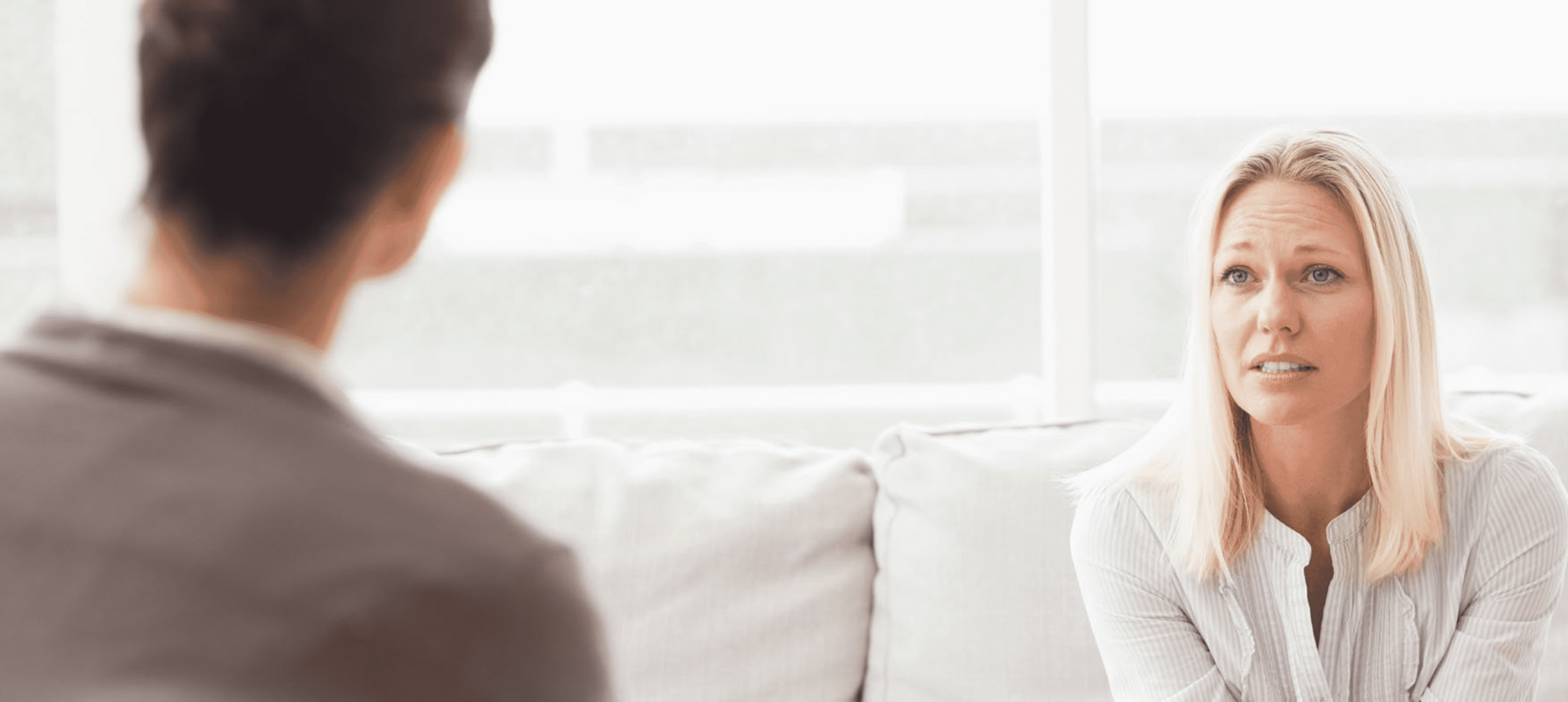 Therapy session with two individuals