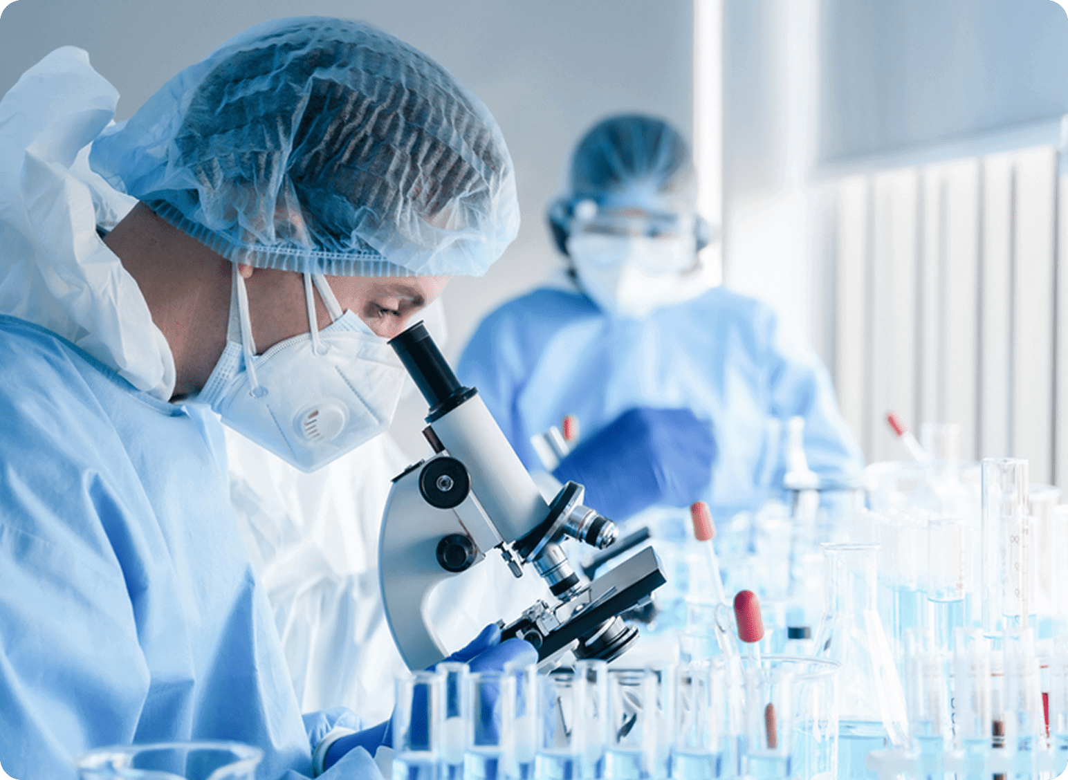 Laboratory researchers analyzing test tubes