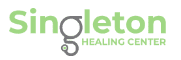 Logo of Singleton Healing Center with green text.